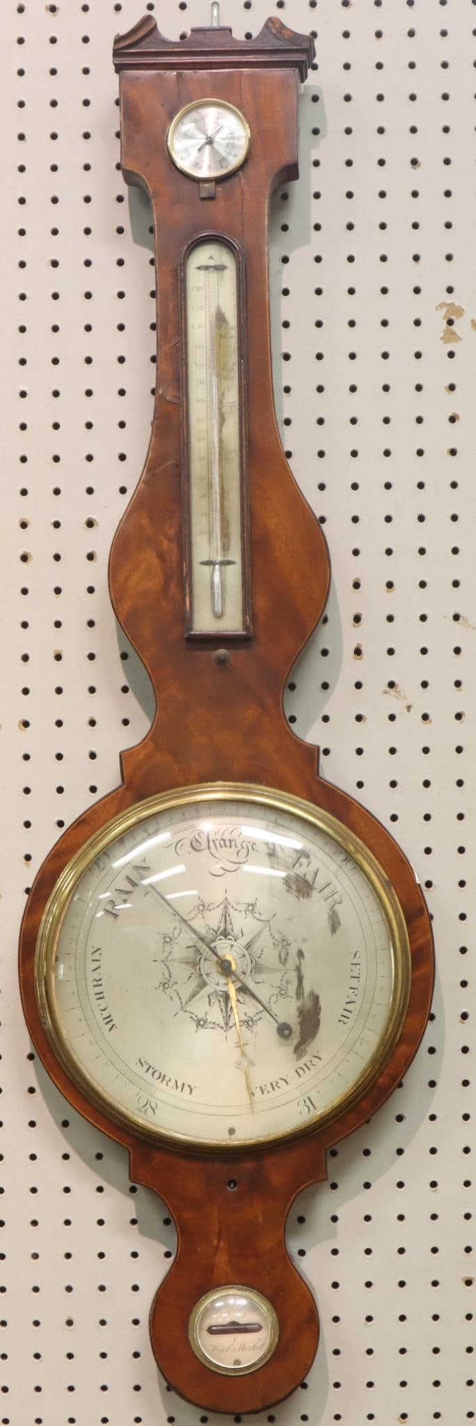 Banjo Barometer by J. Spelzini: Banjo / Wheel barometer. Gauges include level indicator marked "J. Spelzini 6 Brooks Market", hygrometer, temperature and barometer. J. Cottrell clockmaker and repair label en verso. 41"h x 12.5"w