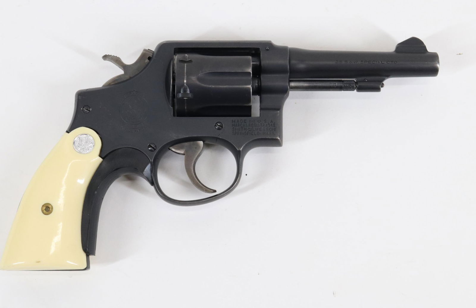 Smith & Wesson 10-5 Double Action Revolver: 38 Special, 4" bbl, SN D25834. 90% matte black finish shows loss and thinning on most edges and average cylinder drag line, good bore, 80% case color on serrated hammer and ribbed trigger, off white p
