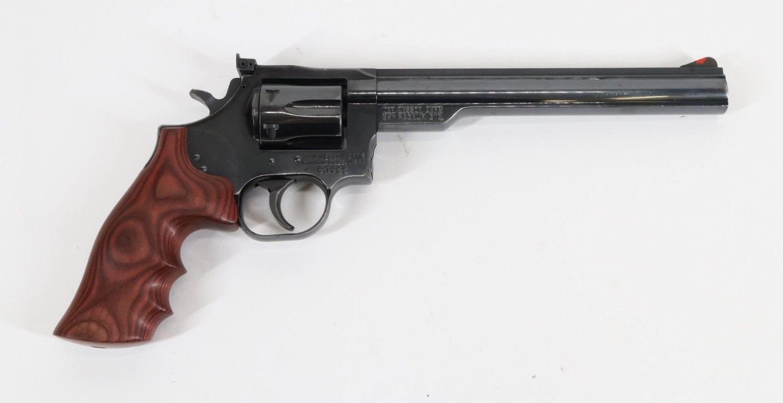 Dan Wesson 15-2 Double Action Revolver: 357 Mag, 8" bbl, SN 74725. 98% blue finish shows average handling with thinning on muzzle, average cylinder drag line and a few scattered scratches and scuff, good bore, solid rib, adjustable rear sig