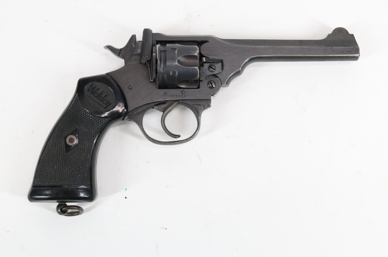 British Webley & Scott Mark IV38 Double Action Revolver: 38/200 (Identical to 38 S&W but loaded with 200 gr bullet for military service) 5" bbl, SN 128164. 85% matte gray finish shows general thinning with loss on crisp edges and scattered freckles, good bo