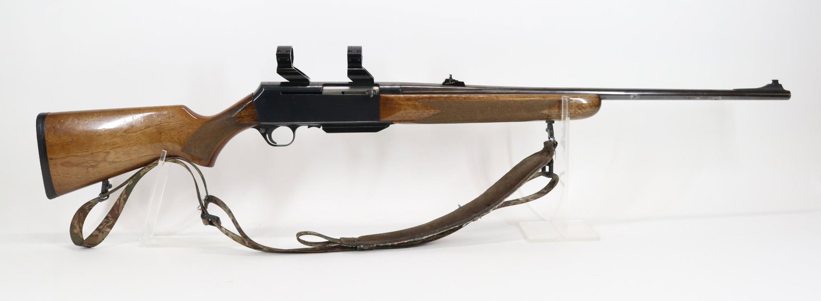 Browning (Belgian) BAR Semi Automatic Rifle: 300 Win Mag, 24" bbl, SN 137PT20542. 85% blue finish shows areas of loss and shallow pitting and freckling, good bore, Holden Ironsighter scope rings, high gloss checkered wood stock and forearm show 