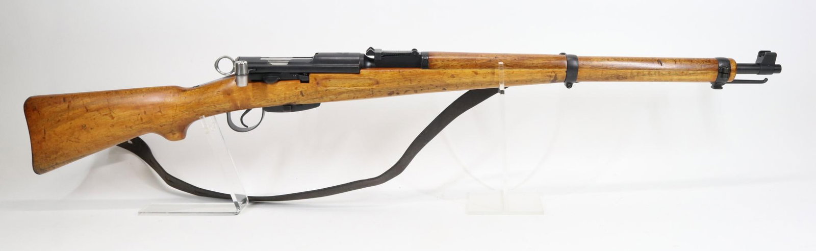 Swiss Schmidt Rubin Sig/CAI K31 Bolt Action Rifle: 7.5x55 Swiss, 25 1/2" bbl, SN 562368. 98% black finish shows very light handling, good bore, receiver ring marked with Swiss crest/shield, matching numbers on receiver, barrel, bolt and the magazine, 