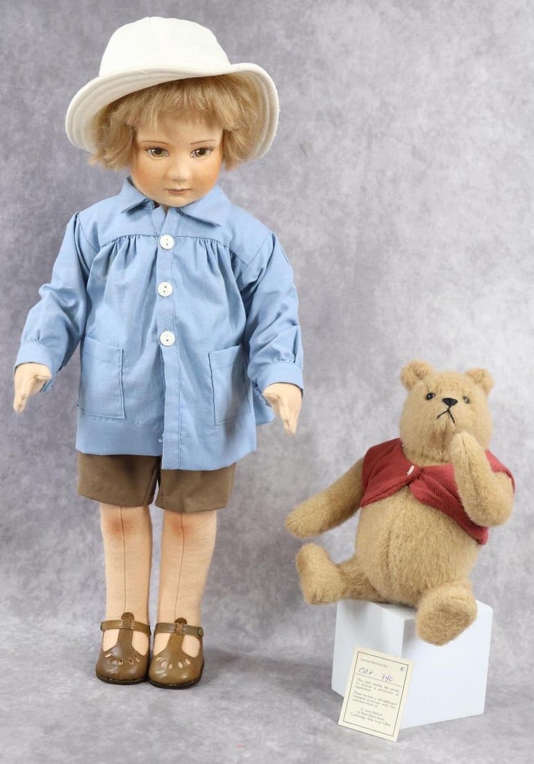 R. JOHN WRIGHT.: 18" 1985 "CHRISTOPHER ROBIN & WINNIE-THE-POOH" in OB. Series I. Doll is tagged on back and card on inside of box with registration number. Ltd. Ed. No. 740/1000. 8" Winnie-The-Pooh is tagged on back N