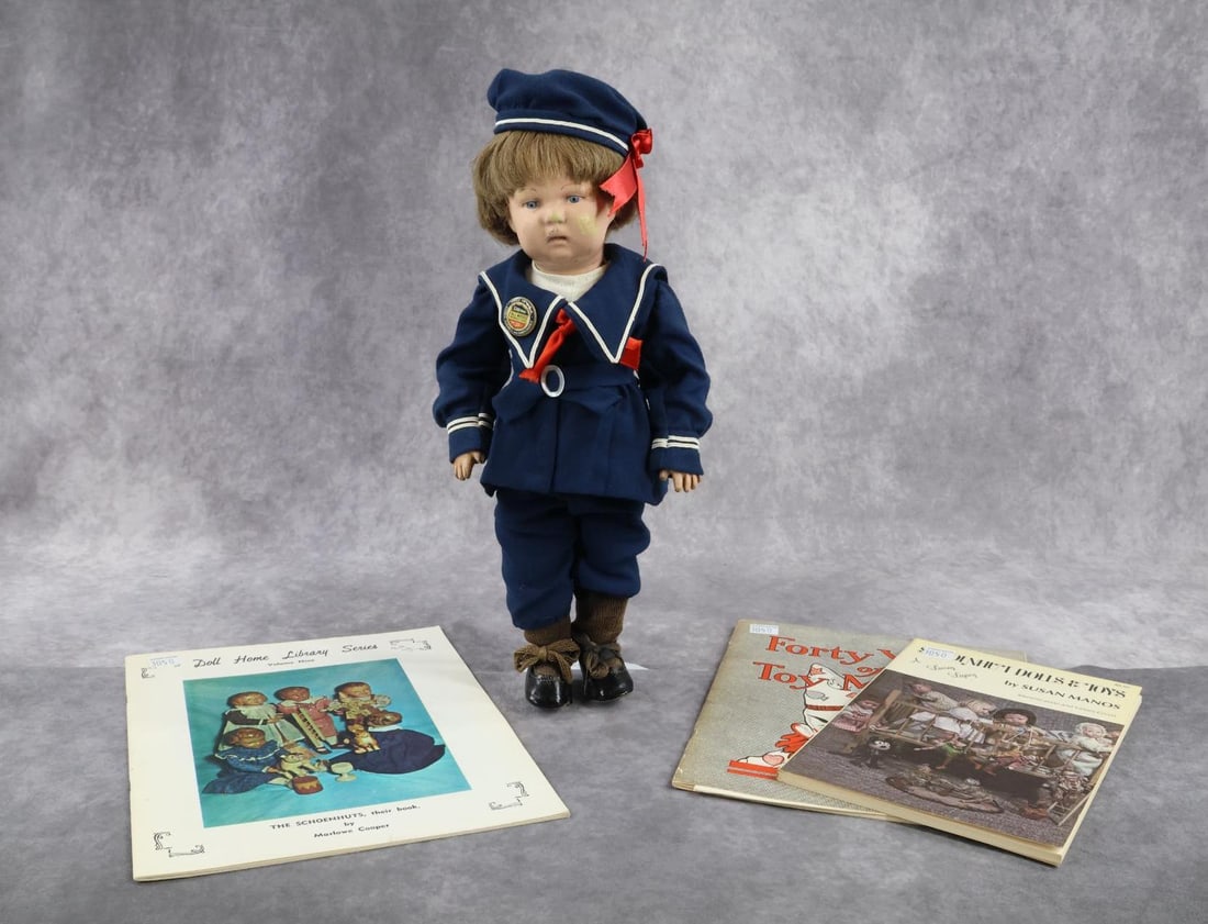 SCHOENHUT.: LOT. Doll - 14" Model 107 Doll on full jointed body. Impressed mark on back of head. Replaced brown human hair wig. No original clothing. Redressed in 3 pc. sailor suit, union suit. Newer shoes, socks