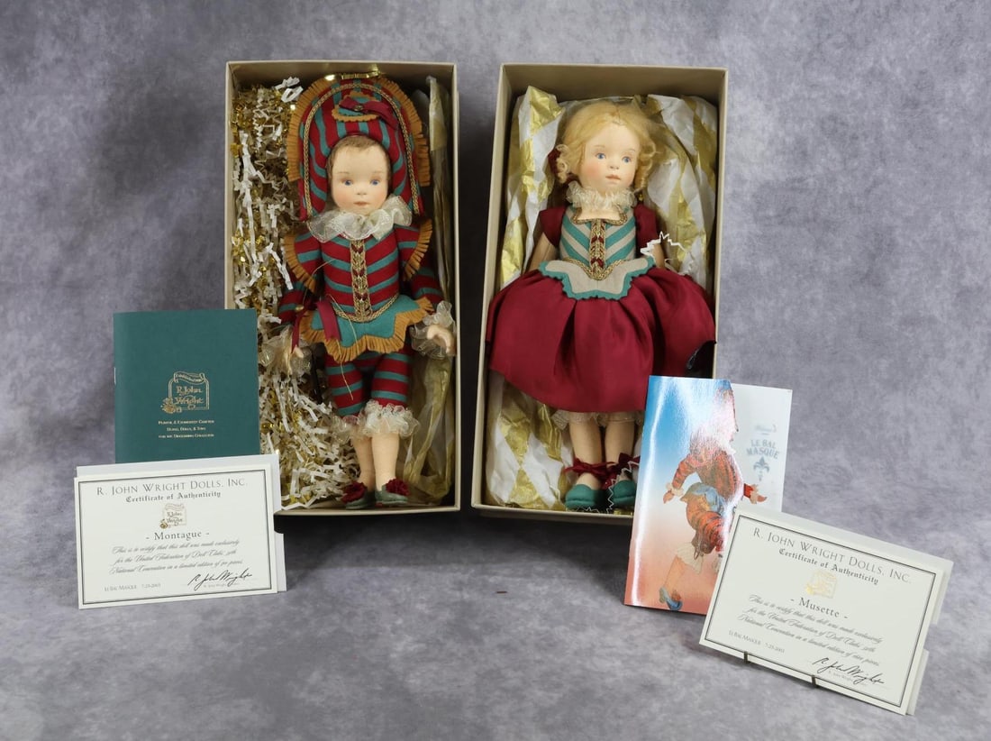 R. JOHN WRIGHT.: Pair of MIB 12" UFDC 2003 New Orleans 54th Convention. "Musette" doll and companion "Montague" doll from the Le Bal Masque. Both of these are also candy containers. "Musette" is a limited edition of 1
