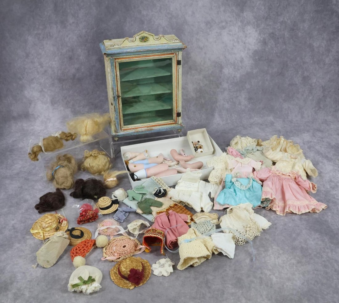 SUPPLIES FOR ALL BISQUE DOLLS.: This LOT is made up of useful items that were removed from damaged antique all bisque dolls. Bisque parts - legs 3", 4 1/4", 4 1/4". Arms. 2", 2 1/4", 2 3/4", 3". (3) Prs. of glass eyes. (7) Wigs - mo