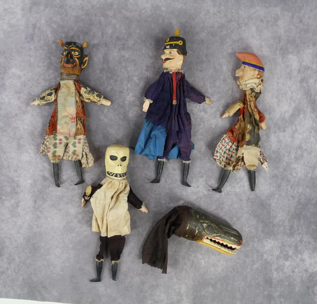 TOYS.: LOT of (5) PUNCH & JUDY style puppets with carved wooden heads. Painted over Gesso puppets, (4) with crude wooden lower arms and legs, cloth clothing. Crocodile has only the cloth body. Condition: age