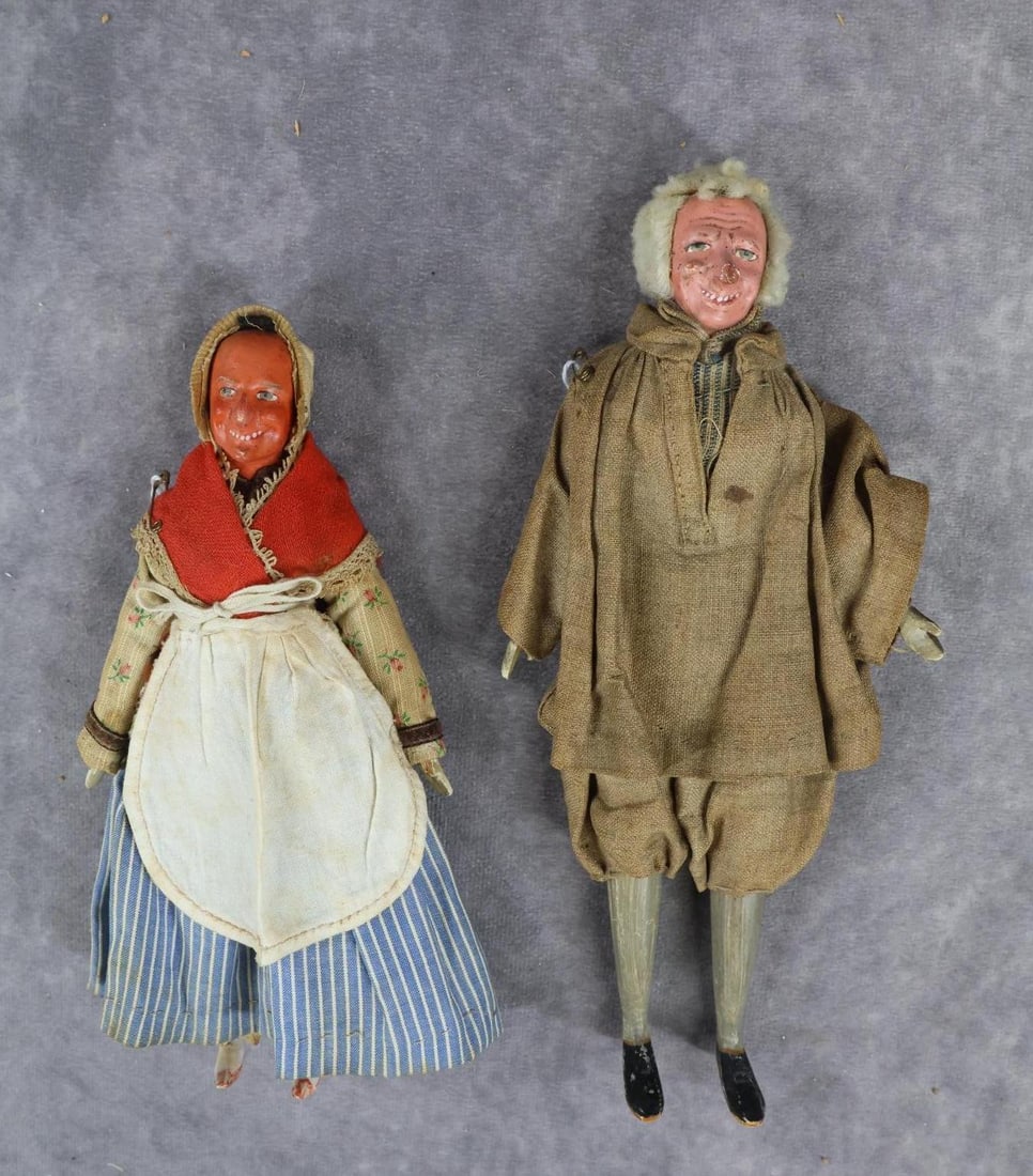 ANTIQUE CHARACTER DOLLS, PAPIER MACHE HEADS.: Pair of German mid-19th C. dolls. These both came from the Richard Wright Collection Auction, 2009. Both dolls have papier mache shoulder heads with whimsical molded facial features, painted eyes, ope