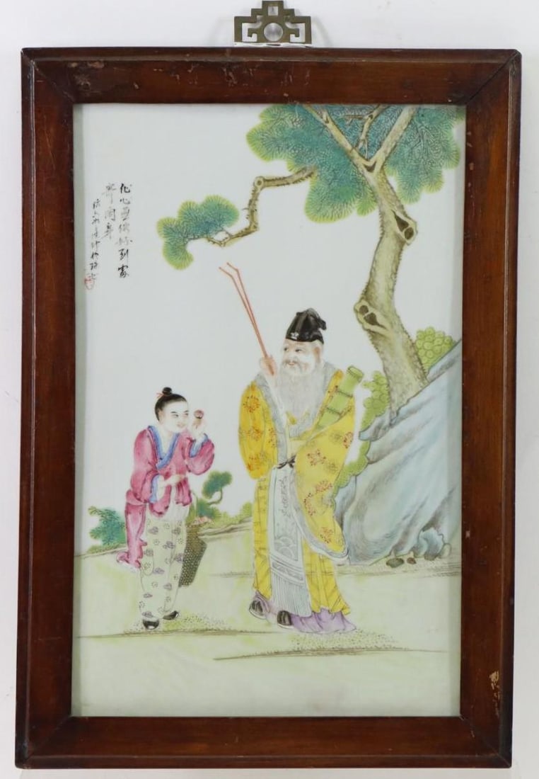 Chinese Famille Rose Porcelain Plaque: Republic era, framed painted porcelain plaque, an allegory of spring depicting an old man with scholar's tools and a young girl with a flower, with Chinese calligraphy and seal. 15"h x 9.75"w, 17.5"h 