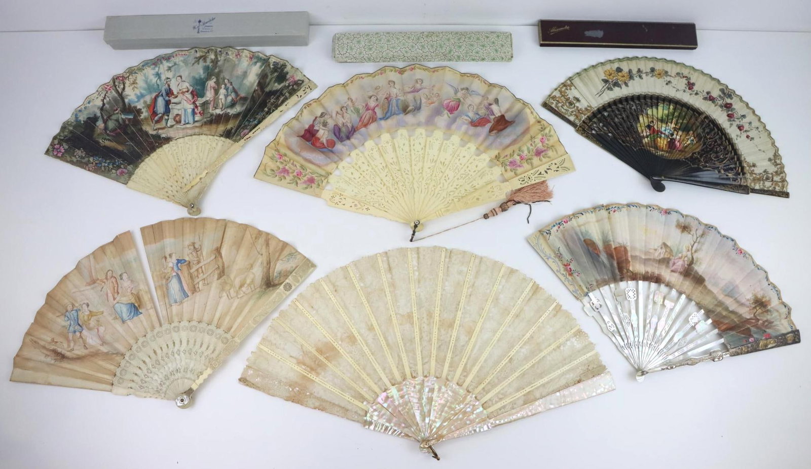 Lace & Hand Painted Folding Fans: Battenburg style lace folding fan with mother of pearl handle and ribs, slight staining on lace. Hand painted folding fan, black lacquered and fabric. Hand painted folding fan, angelic scene, fabric, 