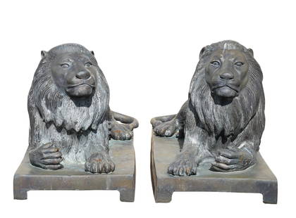 Recumbent Lion Garden Sculptures: Cast white metal sculptures of resting lions attached to plinth bases with straight feet. Pair. 24"h x 17"w x 40"d