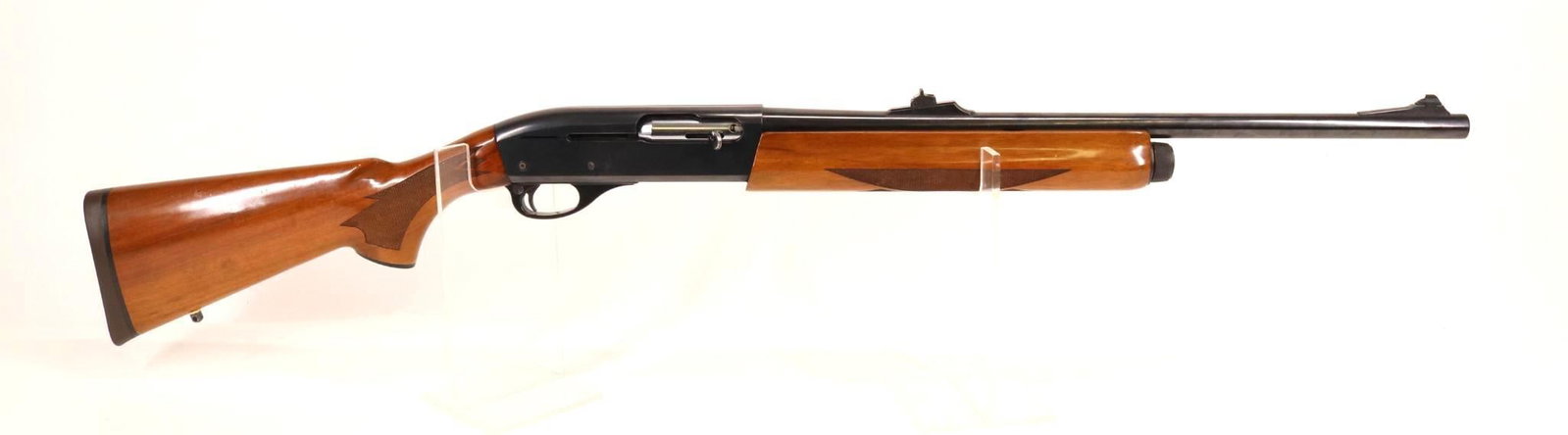 Remington 1100 LT-20 Deer Gun Combo Semi Automatic Shotgun: 20Ga, 21" bbl, 2 3/4" chamber, Imp cyl choke, SN RO19248K. 95% blue finish shows average handling with thinning on carry points and abrasions on left side of receiver, good Smooth bore, rifle sights, 
