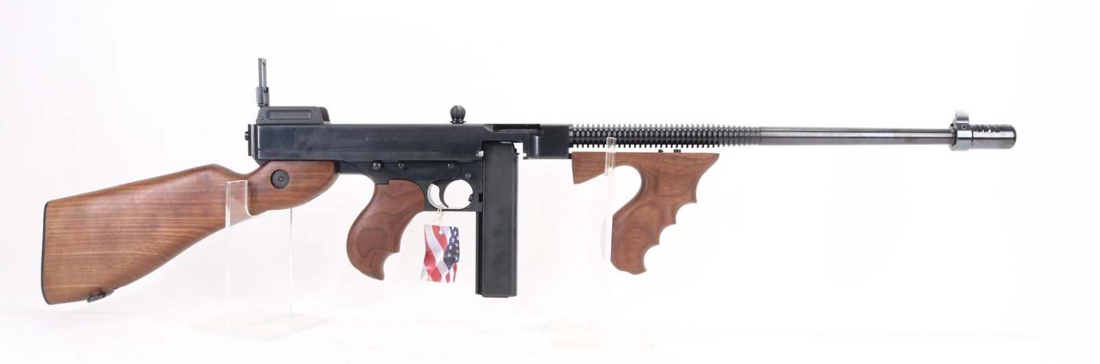 Auto Ordnance Thompson Model Of 1927A1 Semi Automatic Carbine: 45ACP, 18 1/4" bbl including flash hider, SN KP6653, 100% blue finish, good bore, pinned flash hider, wood stock, finger groove pistol grip and finger groove vertical forearm grip show light handling 