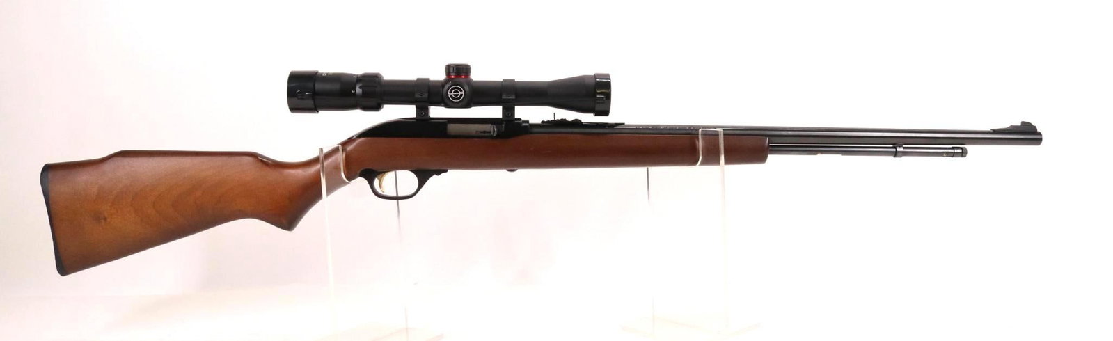 Marlin Model 60 Semi Automatic Rifle: 22LR, 22" bbl, SN 08289221. 100% blue finish, good bore, Simmons 22 Mag 3-9 rifle scope with duplex reticle and clear optics wood stock shows light handling with a few factory thin spots in stain colo