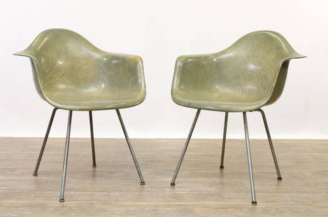 Charles and Ray Eames for Herman Miller Rope Edge Shell Chair: Molded fiberglass pair of DAG armchairs in greige, each with molded rope edge, H base, and checkerboard labels. 31"h x 24.75"w x 23"d, seat height 18"