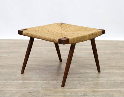 Rush Seat Stool: Manner of George Nakashima, walnut stool with woven rush seat and flared tapered round legs. 12.25&rdquo;h x 18&rdquo;w x 16&rdquo;d