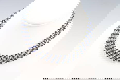 Tiffany & Co. Diamond and Sapphire Necklace: Ladies platinum diamond and sapphire necklace set with 219 round brilliant cut diamonds, color G VS clarity, weighing approximately 17 carats total weight with (219) very fine blue round sapphires, 3m