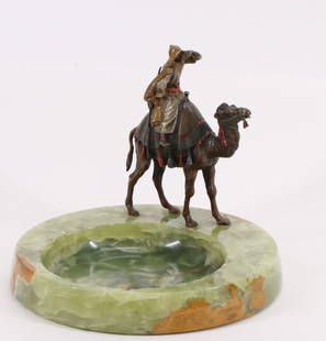 Austrian Cold Painted Bronze and Onyx Desk Tray: Manner of Franz Bergmann, Orientalist cold painted bronze camel and rider mounted to a green onyx desk tray, marked Austria to the camel's stomach. There are scattered chips to the interior rim of the