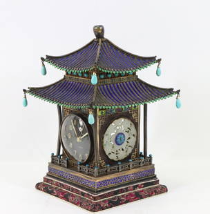 Chinese Enamel Silver Pagoda Clock: The pagoda-form clock with silver filigree detailing to the stylized roof, channels of filigree between cobalt enamel channels, green heart shaped enameling to margins of roof, turquoise tear-drop pen