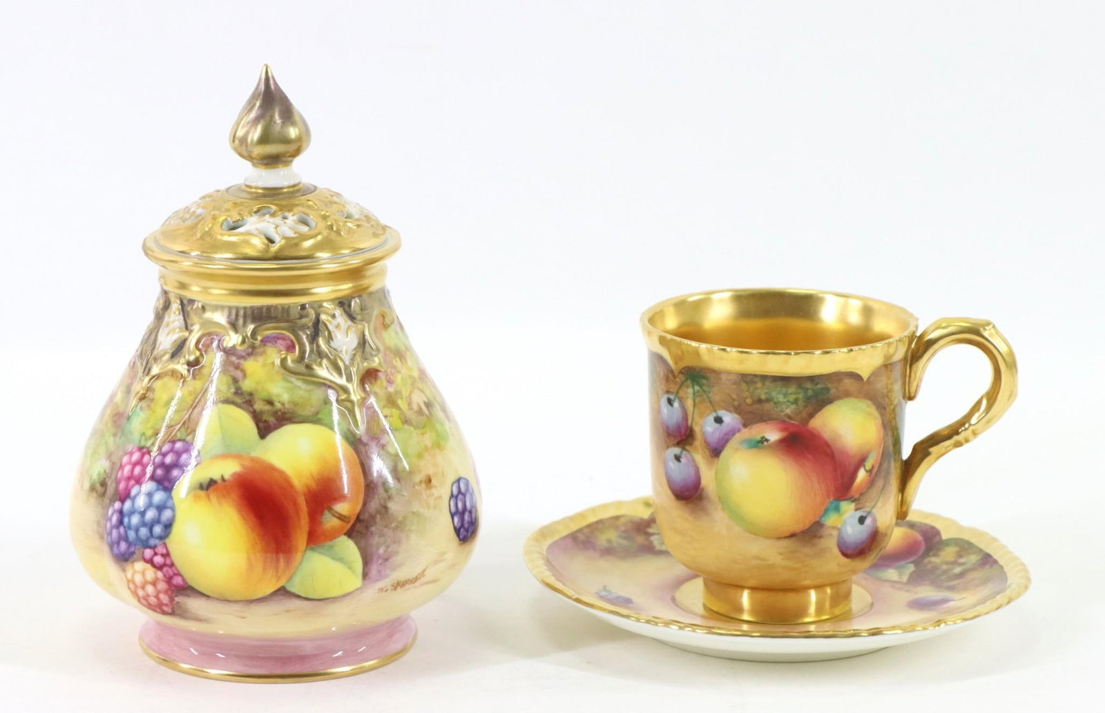 Royal Worcester Hand Painted Porcelain Potpourri and Teacup: Hand painted porcelain potpourri with teacup and saucer. Both signed by J. Skerrett . Tallest 4.75"