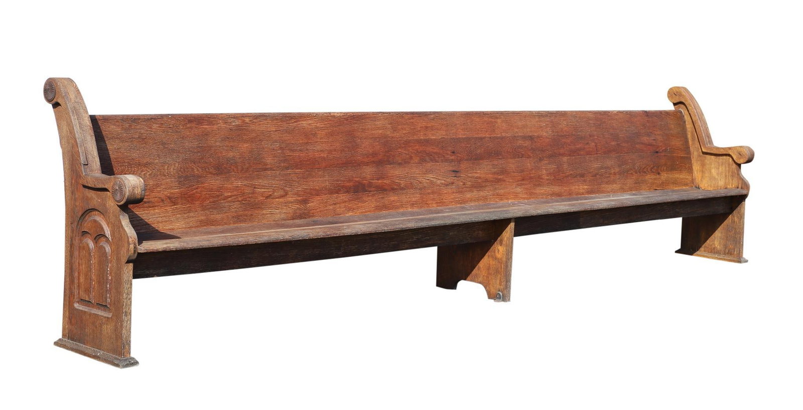 Upper Dublin Lutheran Church Pew: Scrolled arms and arched paneled sides, back mounted bible pockets, on plinth feet. 38"h x 164"w x 20"d