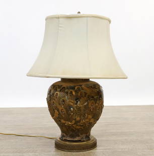 Japanese Satsuma Pottery Jar Table Lamp: Showa era Japanese Satsuma pottery jar, thousand faces motif with dragons, textured and with gilt accents, mounted as a three-light lamp. In working condition. 28"h x 12"w