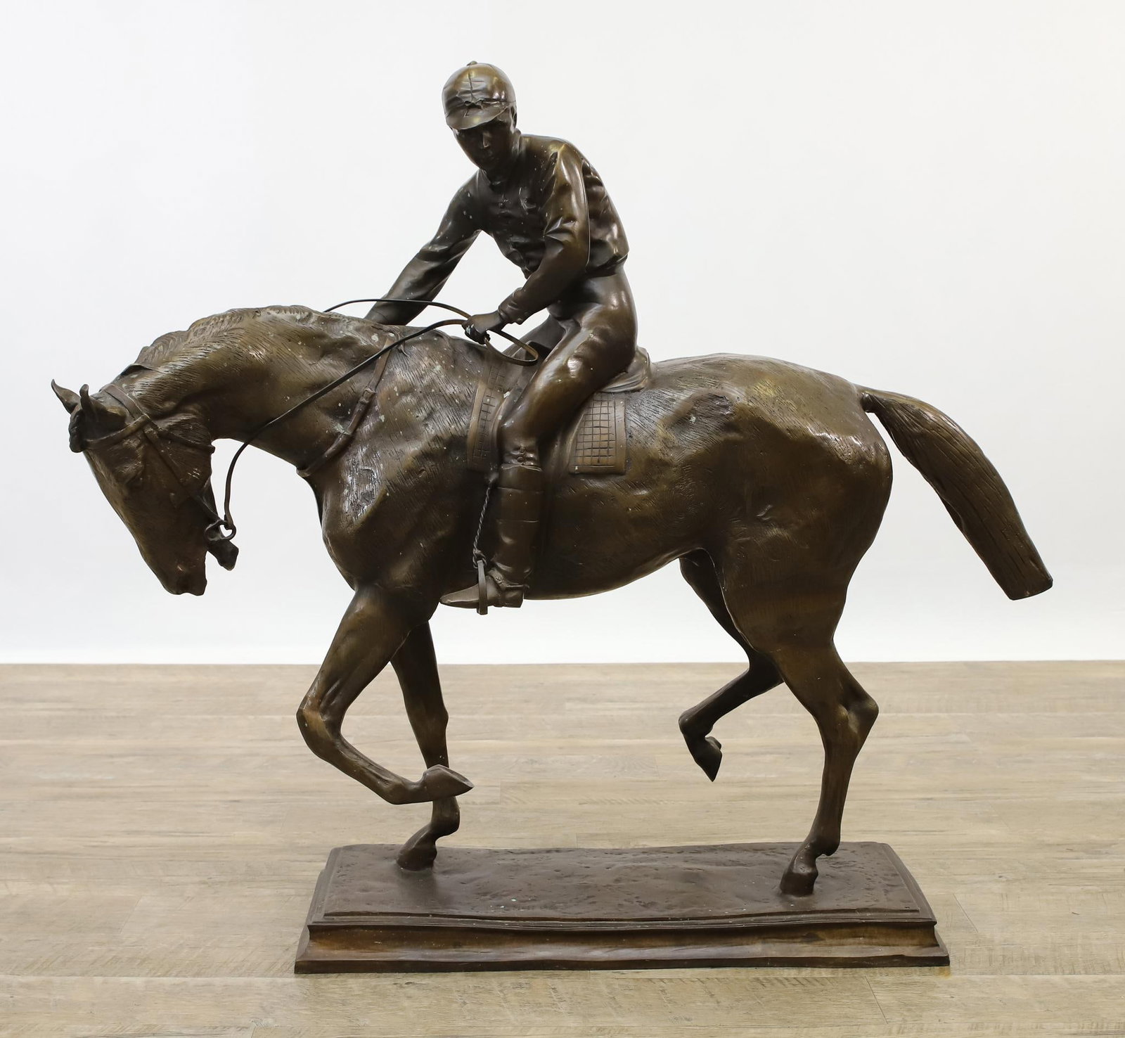 After Isidore Jules Bonheur (1827-1901): Bronze sculpture, "Le Grand Jockey", a jockey on a trotting horse, impressed signature to the base. 34"h x 12"w x 40"d