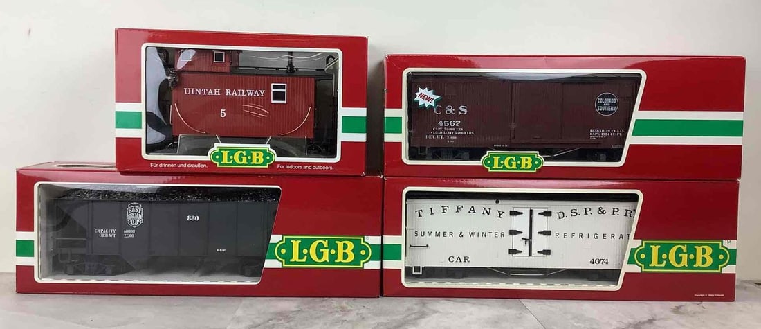 LGB Train Cars: G gauge, LGB Tiffany reefer #4074 B02, Uintah Railway caboose #46650, Colorado & Southern boxcar #45670 and East Broad Top coal hopper #4076.