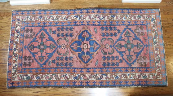 Persian Area Rug: Handwoven wool, floral motif. 72” x 36.5”. Kitchen