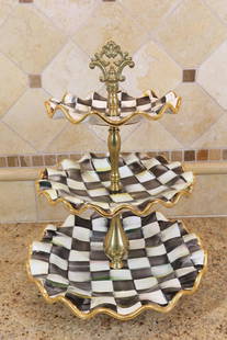 Mackenzie Childs Tiered Serving Dish: Mackenzie Childs tiered serving dish with checkerboard pattern, 16”h x 11”w.