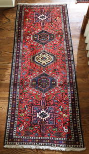 Persian Runner: Hand woven wool runner with central medallions, stylized animals and flowers. 81”lx30”w. Upstairs Landing.