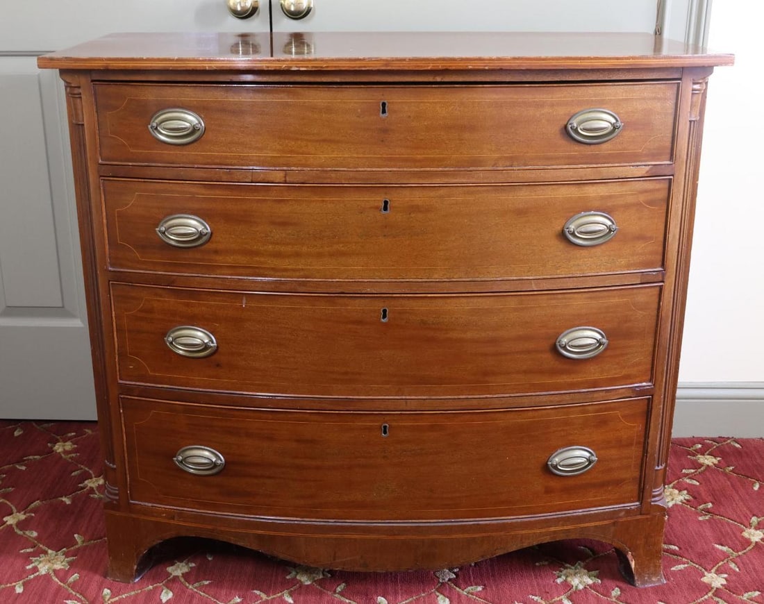 Hepplewhite Chest of Drawers: Mahogany, bow front, 4 drawers, replaced brass, reeded quarter columns, line inlay, French feet. 35”h x 39.5”w x 21.5”d. Bedroom 2 (Upstairs)