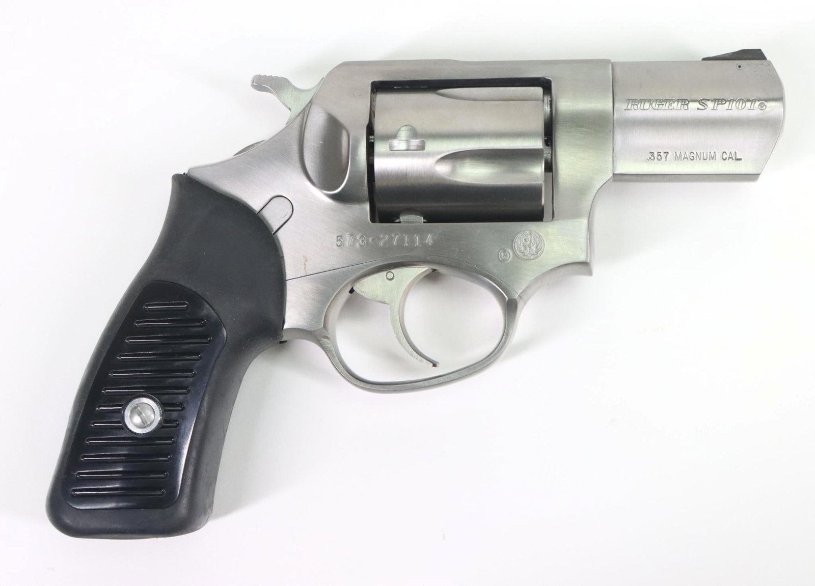Ruger SP101 Double Action Revolver: 357 Mag, 2 1/4" bbl, SN 573-27114. Matte stainless finish shows only very light handling, good bore, rubber grips with ribbed plastic inserts show light handling with papers and factory plastic case. 