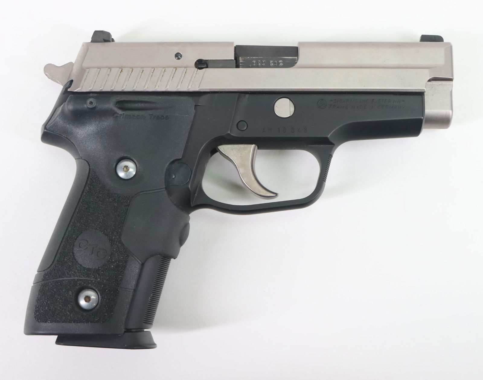 Sig Sauer P229 Semi Automatic Pistol: 357 Sig, 3 3/4" bbl, SN AH18848. Satin stainless finish on slide shows areas of light freckling, good bore, 3 dot TRU DOT sights, matte black frame shows only light handling, Crimson Trace laser grips