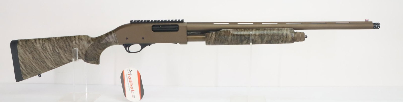 Radikal/International Firearms PA-2 Pump Action Shotgun: 20Ga. 22" bbl, 3" chamber, XXF ported choke tube installed with 3 additional tubes, SN W-29015. 100% bronze Cerakote on barrel and receiver, good bore, removable Weaver style scope rail, vent rib with