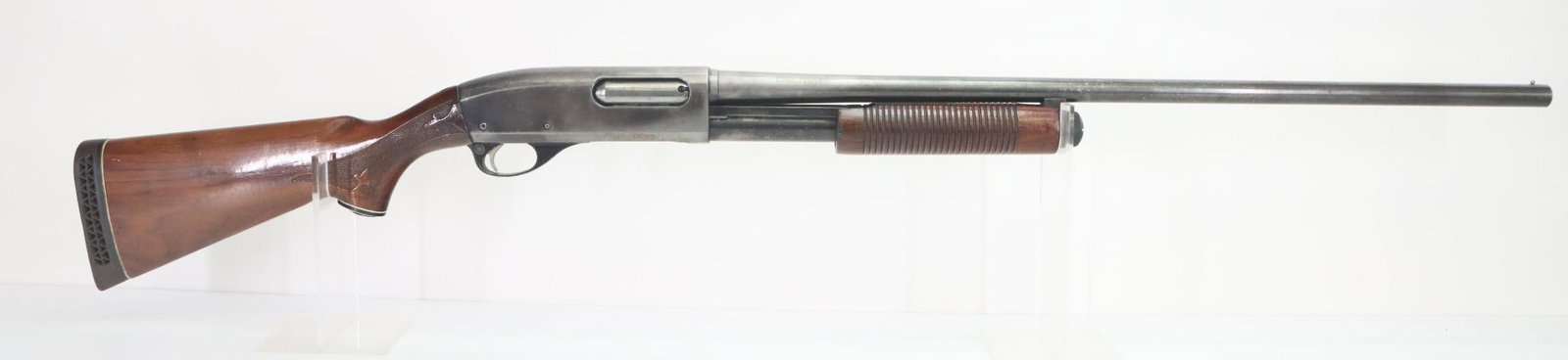 Remington 870 Wingmaster Pump Action Shotgun: 16Ga. 28" bbl, 2 3/4" CHAMBERS, Mod choke, SN 545982W. Gray patina with 25% very thin blue finish, good bore, checkered wood stock and ribbed forearm show moderate handling with numerous chips at rear
