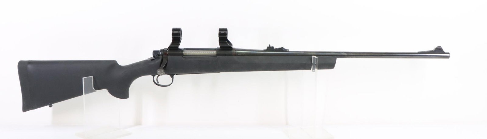 Remington 700 BDL Bolt Action Rifle: 30-06, 22" bbl, SN 6755947. 98% blue finish shows a few scattered freckles and a couple small 3/16" abrasions on left side of barrel 1/2" and 4" from muzzle, good bore, Kwik Site scope rings, jeweled 