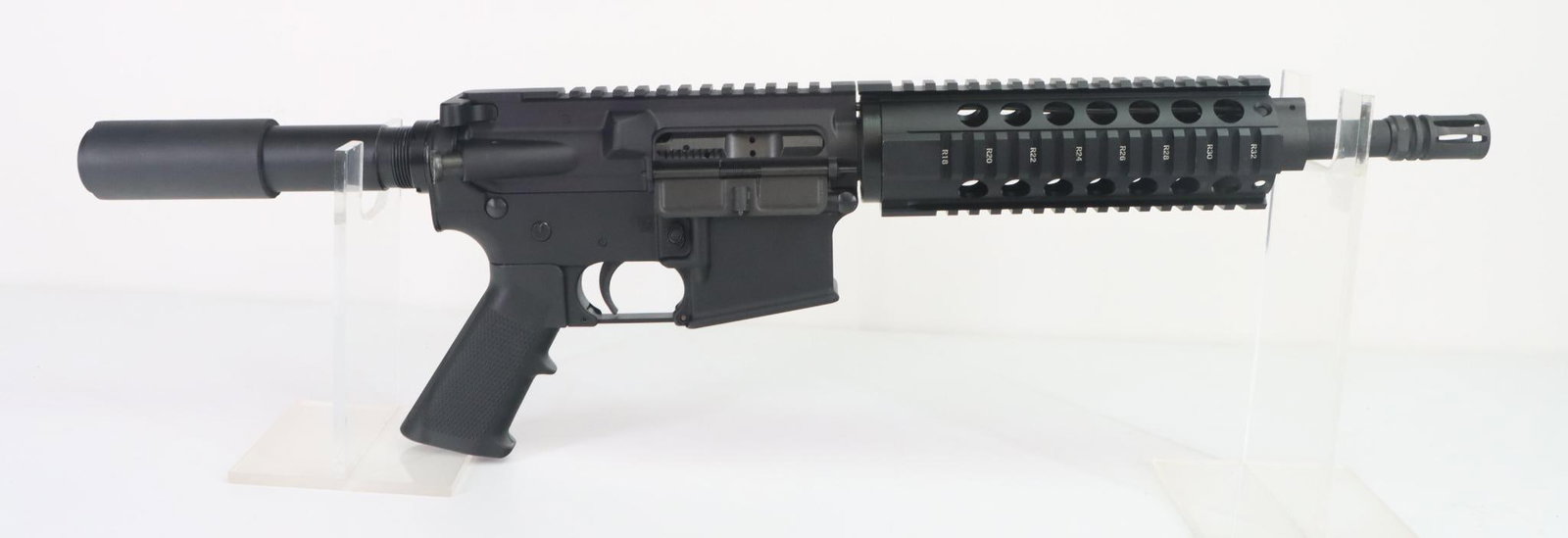 Bear Creek Arsenal BCA15P Semi Automatic Pistol: 223 Wylde, 12" bbl including flash hider, SN P00611. 100% matte black finish, good bore, quad rail handguard/heat shield, full length top rail, flash hider, checkered pistol grip with case and papers.