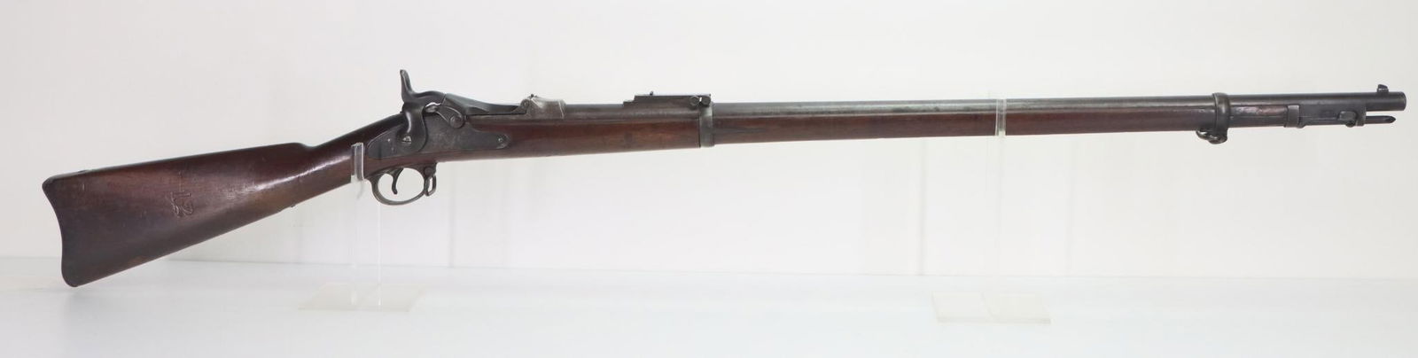 Springfield Model 1884 Trapdoor Rifle: 45-70, 32 1/2" bbl, SN 531190. Dark gray/silver patina, fair bore, left side of barrel at breech marked with V P eagle head over P and A on top of barrel, Buffington rear sight, breech block marked in