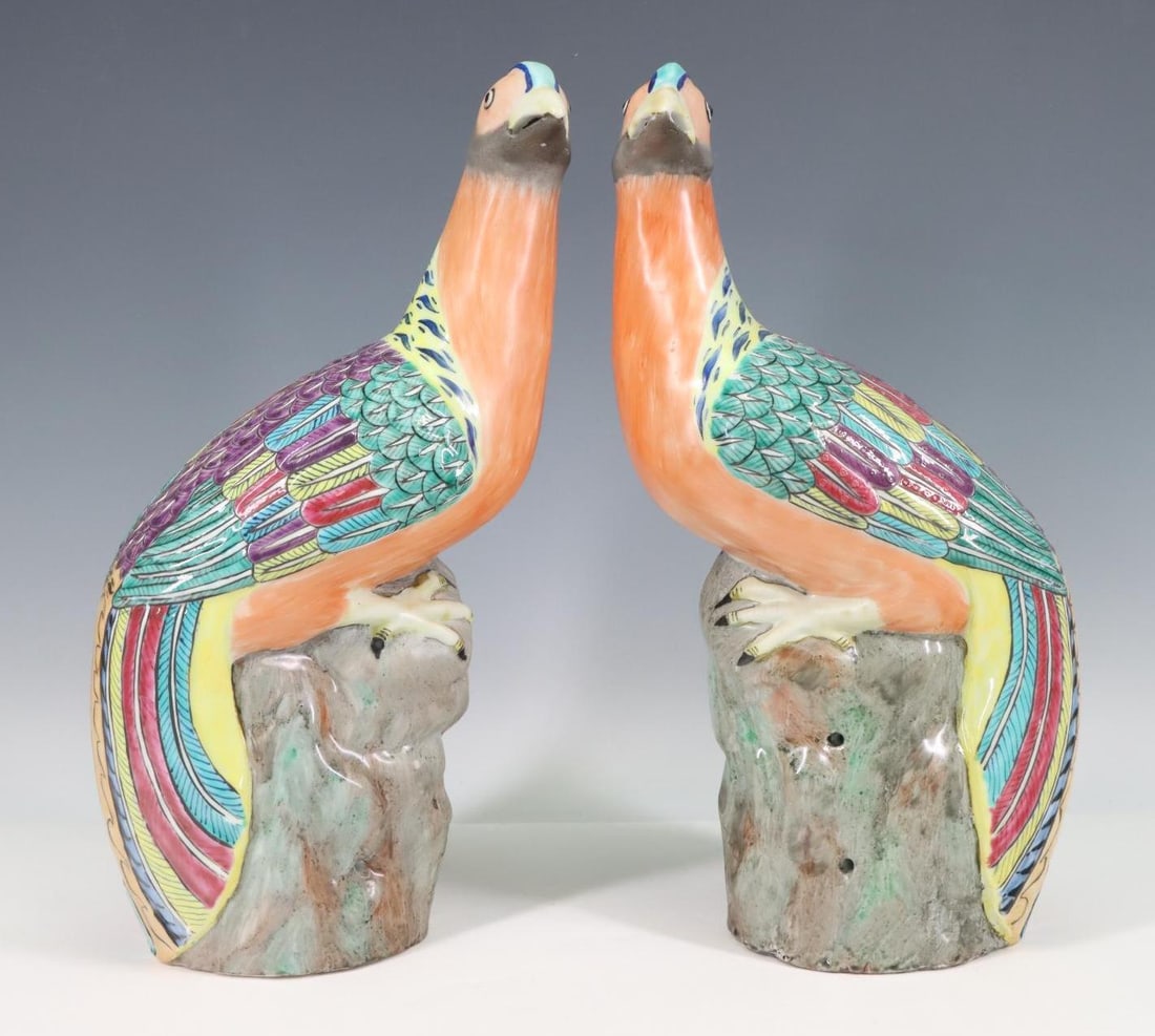 Chinese Export Famille Rose Pheasants: Qing era, pair of Chinese export pheasants, modeled in mirror image, perched on rockwork. Bases unmarked, 12"h