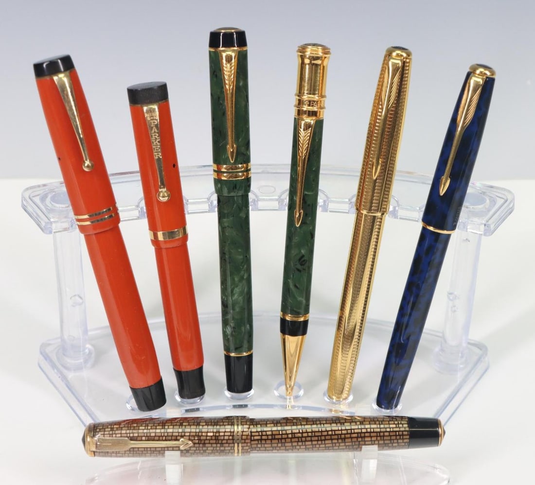 Parker, Fountain Pens, 14k and 18k Nibs: Parker fountain pen, 14k Nib Vacumatic, Golden Web pattern, has been inked. Parker fountain pen, Sonnet, blue. Parker fountain pen, gold tone, 18k nib (750), has been inked. Parker fountain pen, Sonne