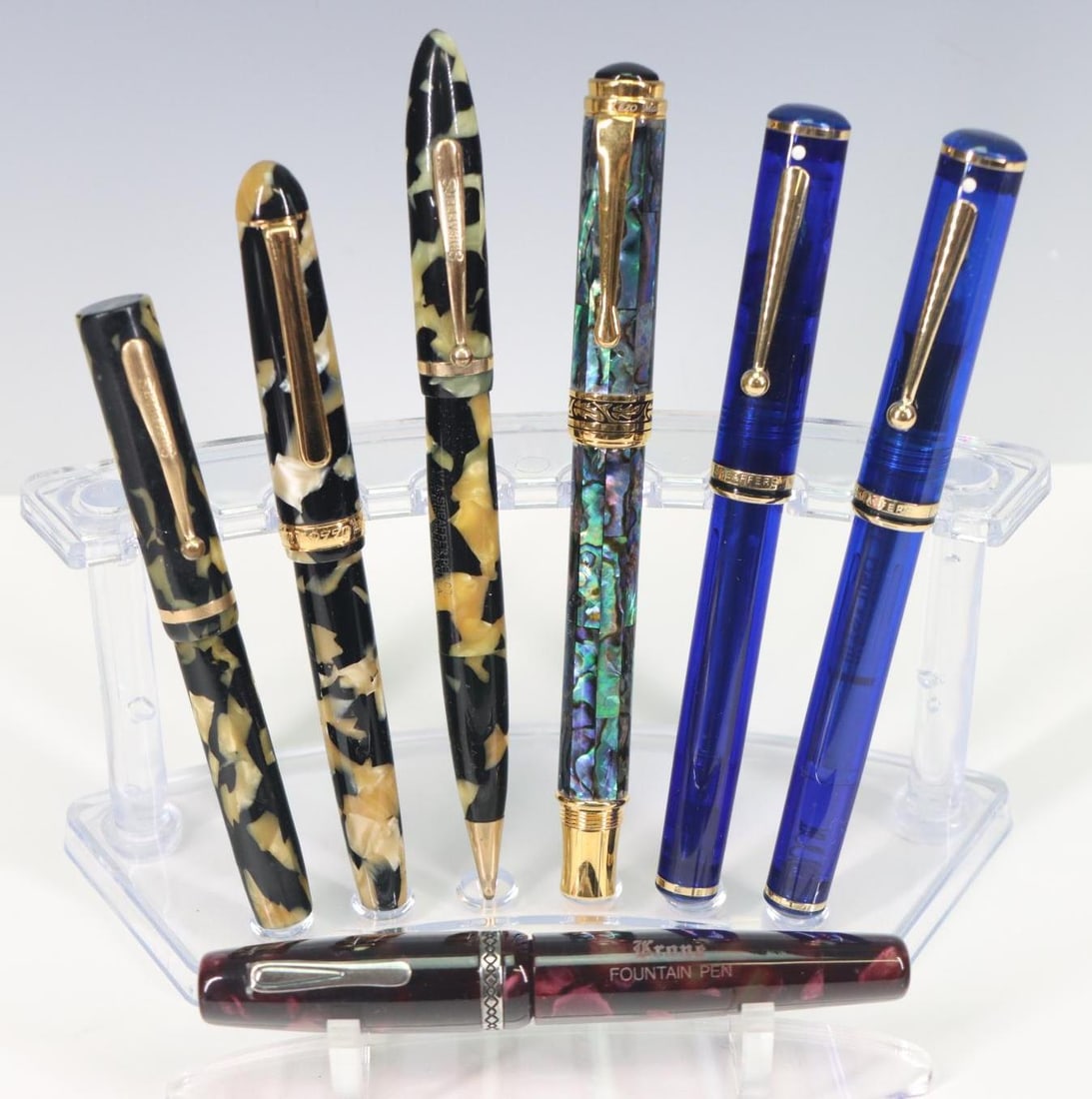 Xezo, Sheaffer, Krone Fountain, Ballpoint Pens and Pencil: Xezo fountain pen, abalone, limited edition, 18k gold-plated, original box, has not been inked. Sheaffer Levenger, fountain and ballpoint pen pair, 14k nib, has been inked. Krone, fountain pen, burgun