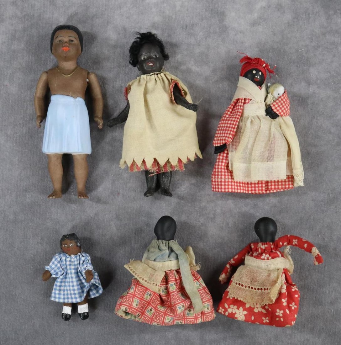 BLACK DOLLS.: LOT of (6) dolls. 2 1/2" - 5". Doll 1) all bisque unmarked "Native Boy" doll with strung arms, painted clothing, beaded necklace. Doll 2) Bisque head doll marked 34-1 with painted features, open mouth
