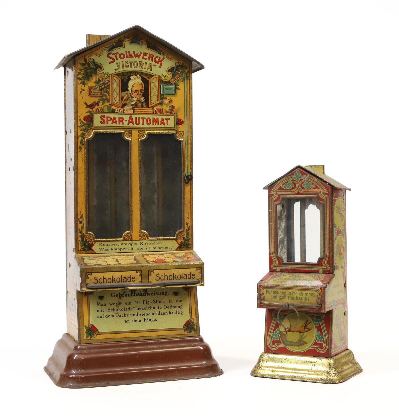 Stollwerck Spar-Automat Dispensers & Banks: Stollwerck, Germany, tin lithograph "Victoria" Spar-Automat take-home candy dispenser, text in German, once empty it is used as a coin savings bank, marked, 11"h x 5.25"w base. Stollwerck, Germany, ti