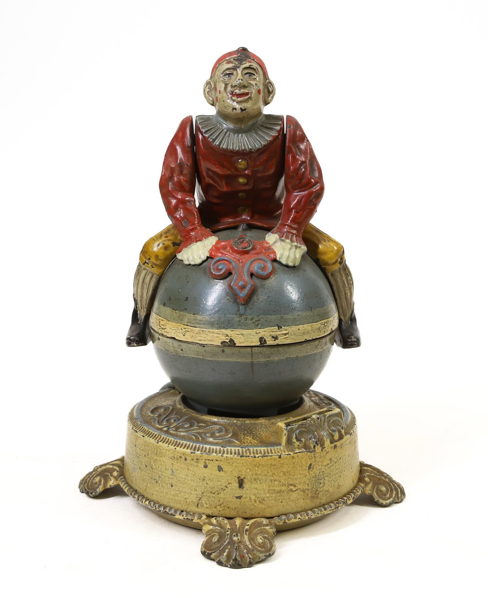 J. & E. Stevens "Funny Clown" Mechanical Bank: J. & E. Stevens "Funny Clown" cast iron mechanical bank, retains much of its original paint, spinning and hand stand latch mechanisms are still in working order, 9.25'h x 6.5"w base.