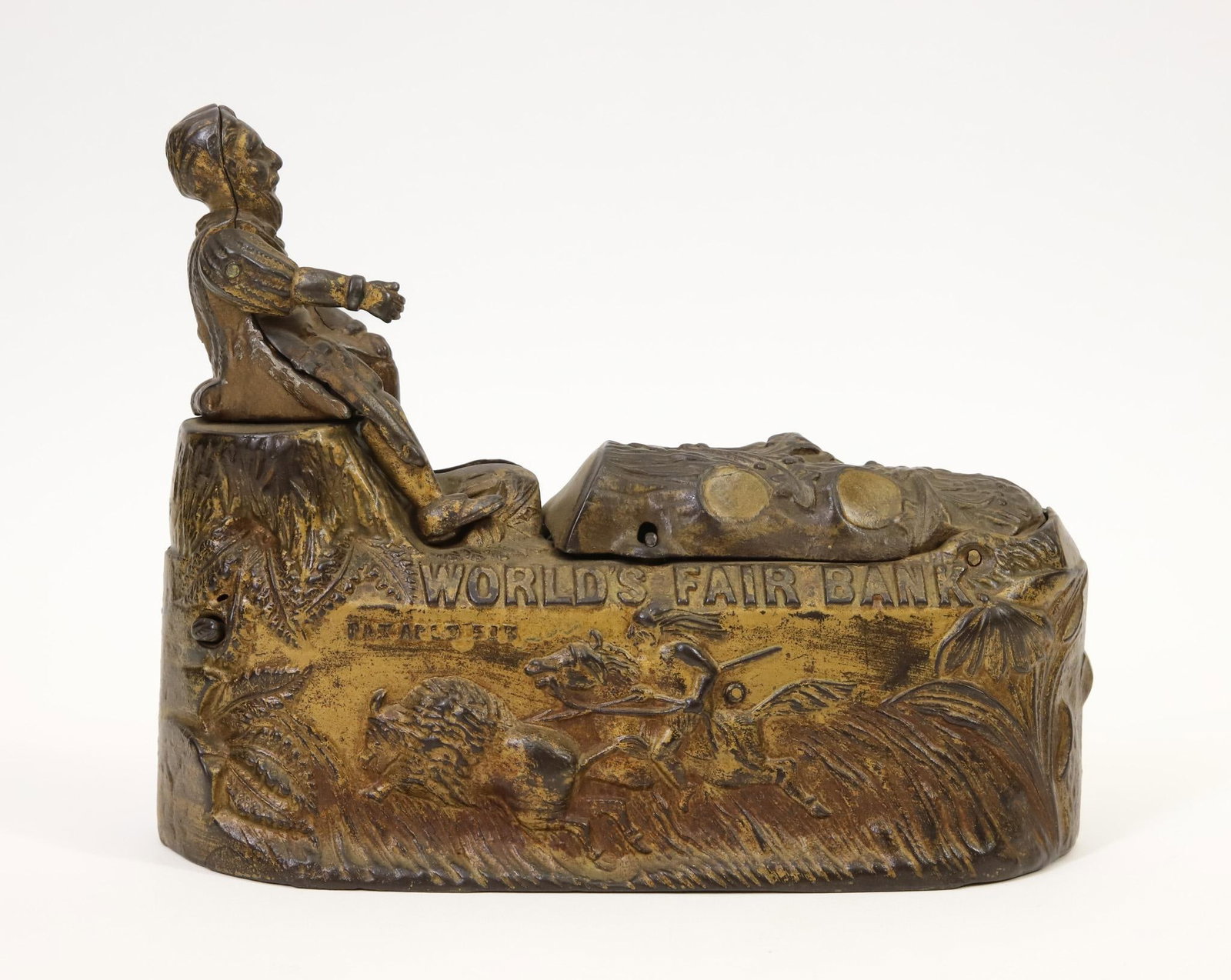 J. & E. Stevens "World's Fair" Mechanical Bank: J. & E. Stevens "World's Fair" cast iron mechanical bank, bronze finish, celebrating the 1893 World's Fair Columbus Exposition, coin goes from the feet of Columbus, disappears into the log as Indian C