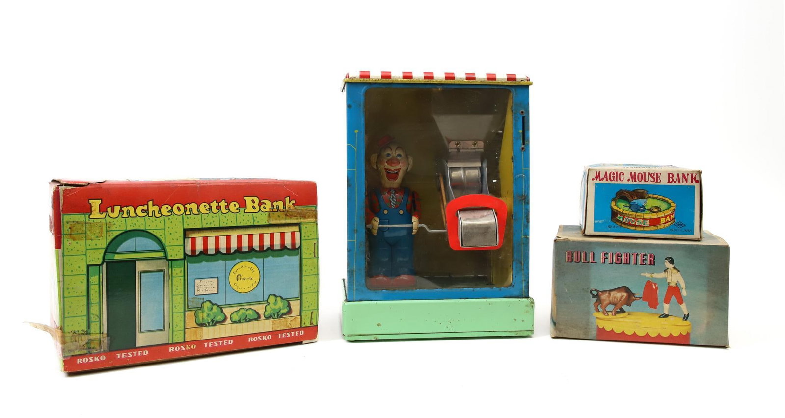 Mechanical Bank Grouping: Japanese "Magic Mouse" tin lithograph wind-up mechanical bank, original box, in working order, Rosko Tested "Luncheonette" tin lithograph mechanical bank, includes doll, in original box, battery-opera