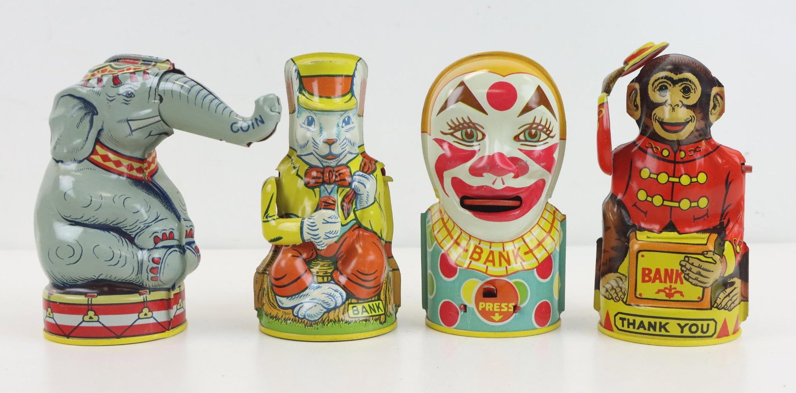 Chein Tin Lithograph Banks: Chein Playthings, 1972 reissue, tin lithograph mechanical banks, includes Circus Elephant, Clowns, Uncle Wiggily and Monkeys, each 5”h.
