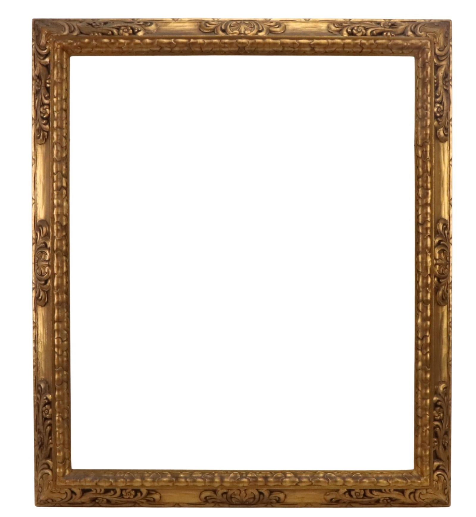 Newcomb Macklin Frame: Carved gilt frame by Newcomb Macklin rabbet measures 30.5" x 25.25" and 35" x 30" overall.