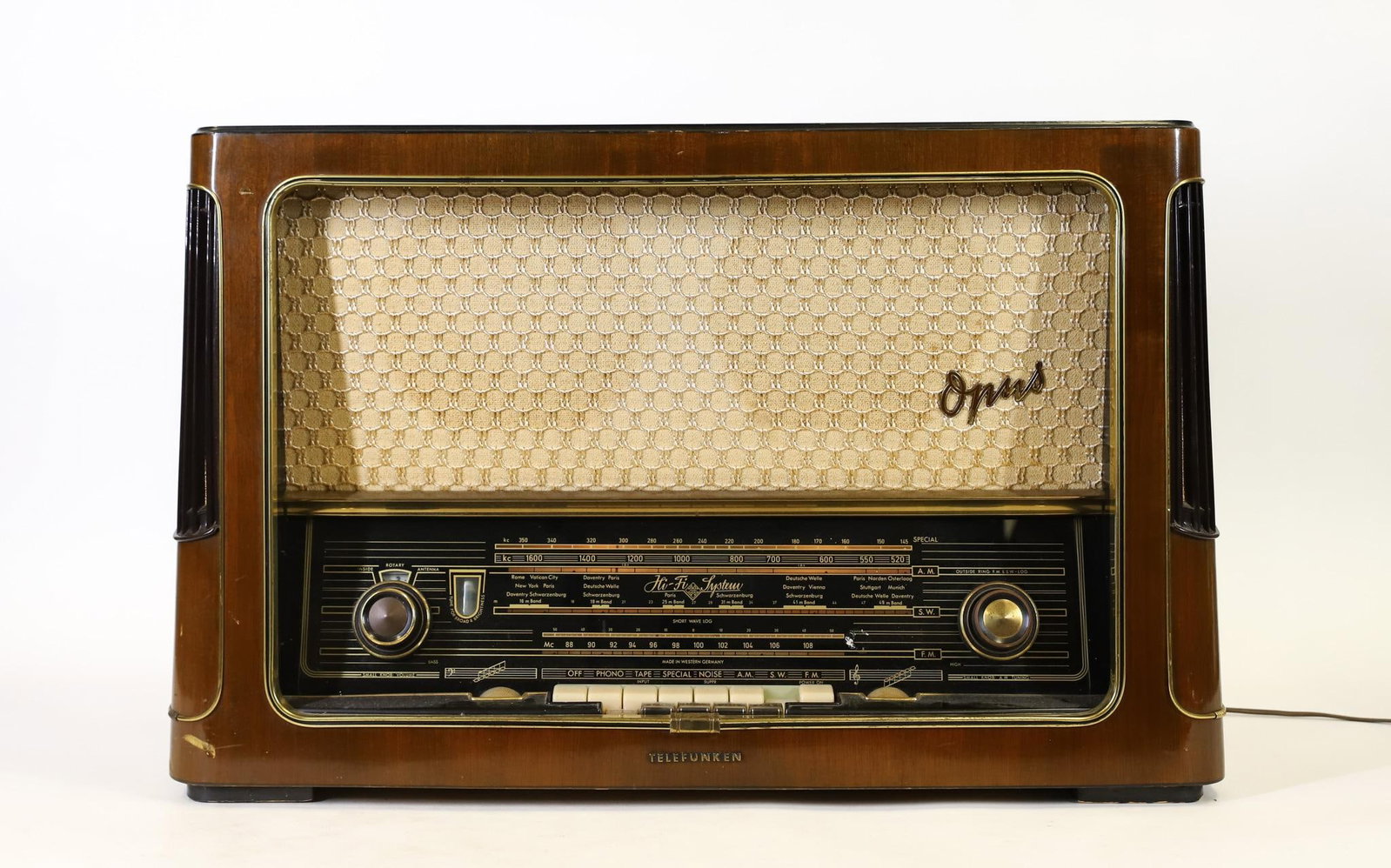 Telefunken Opus Hi-Fi 7 Radio: Serial No. 078666. Made in West Germany. Radio powers on and can receive and play a minimum of tuning channels. 16.5"h x 25.5"w x 10.5"d